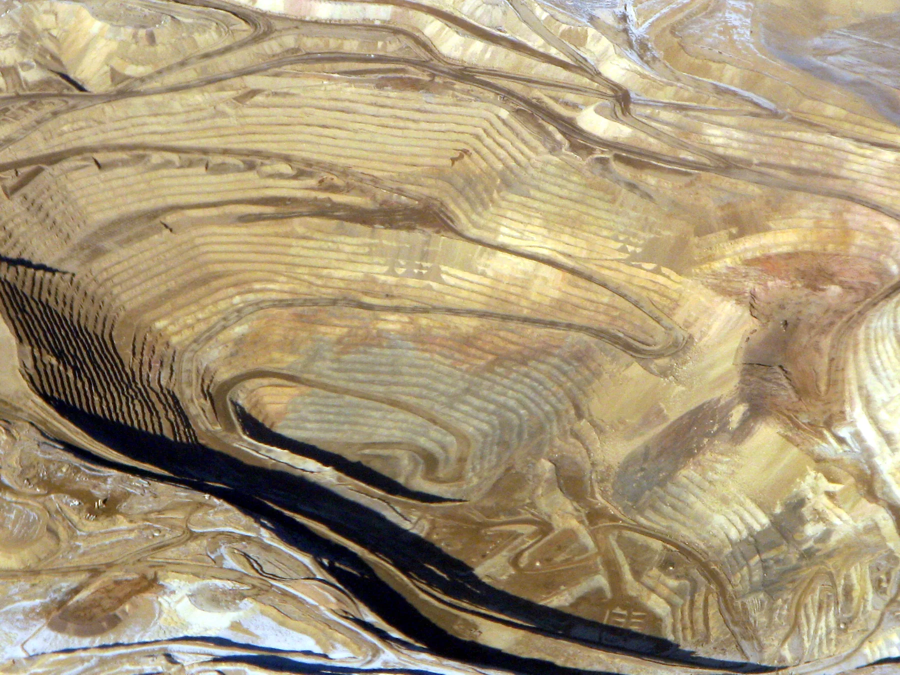 Terraced haul roads at Round Mountain gold mine, Nevada. Reference photography.